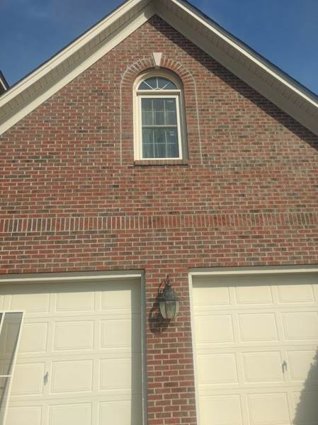 small window above garage