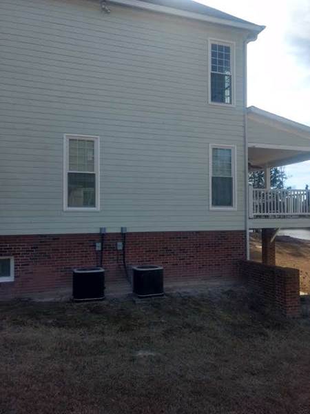 outside view of 3 windows on side of house