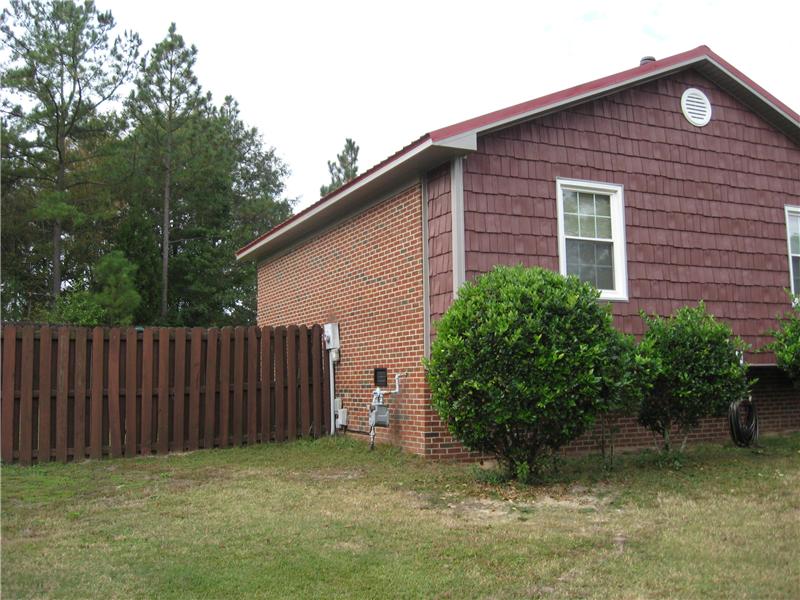 Brown House with New Shingled Roof | Roofing Contractor | Fayetteville, NC