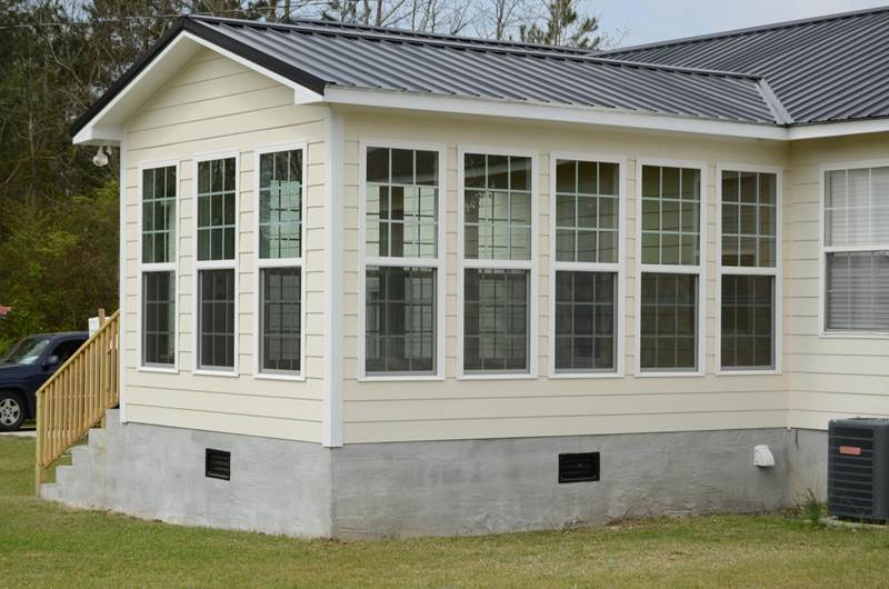 side view of sunroom addition on back of house
