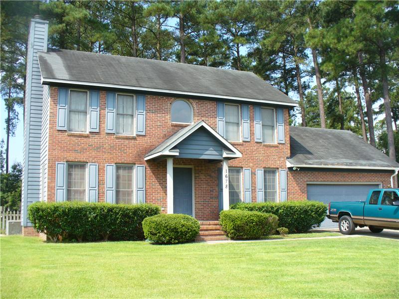 Blue Vinyl Siding on Brick Home, Fayetteville NC Siding Contractor