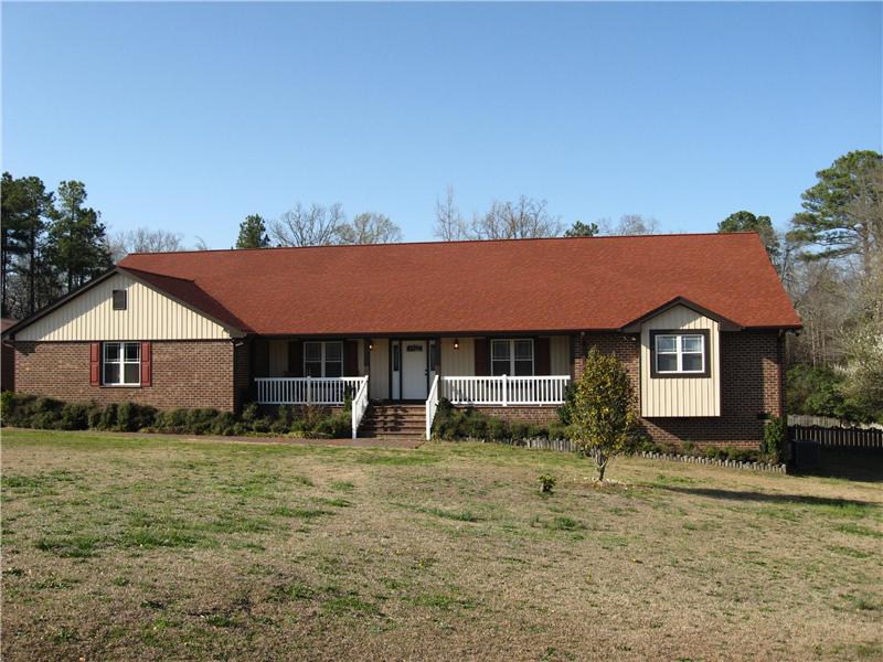 New Vinyl Siding on Brown House | Siding Contractor | Fayetteville, NC