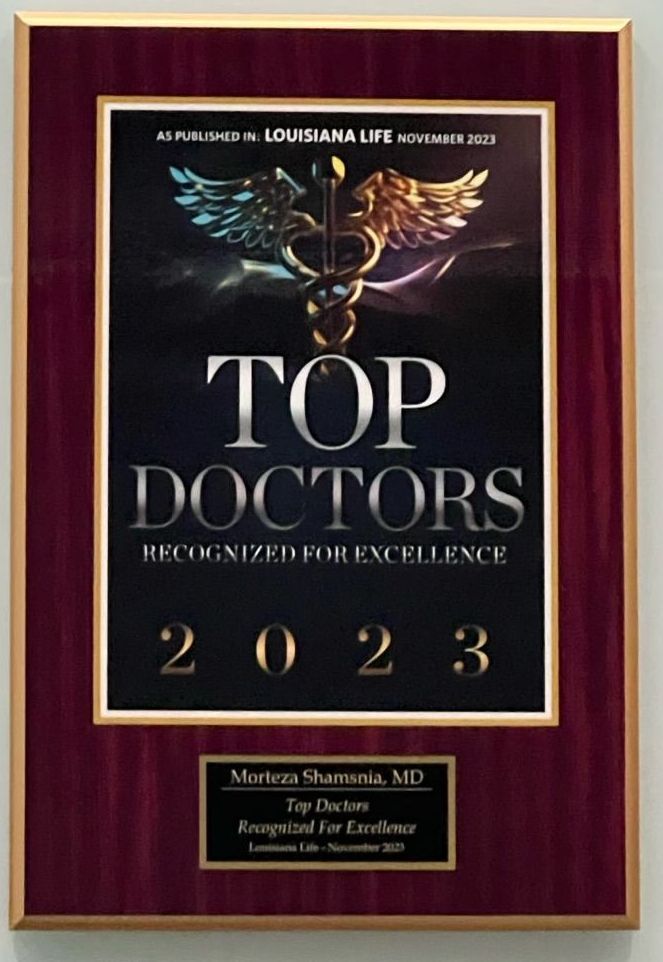 A plaque that says top doctors on it