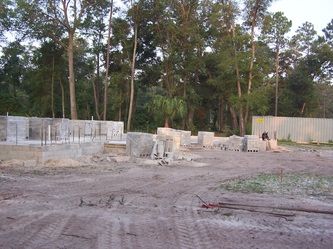 A construction site with trees in the background