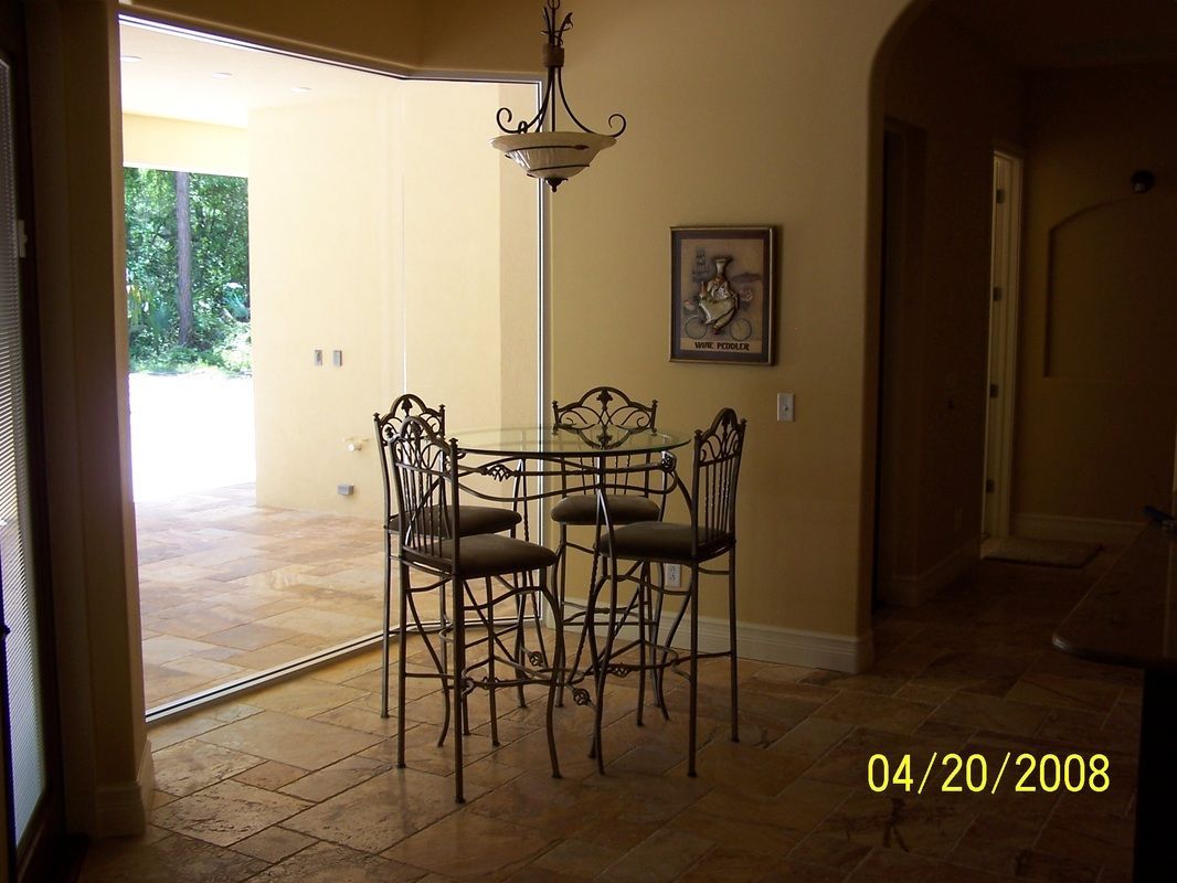 A photo of a dining room table and chairs taken on 04/20/2008