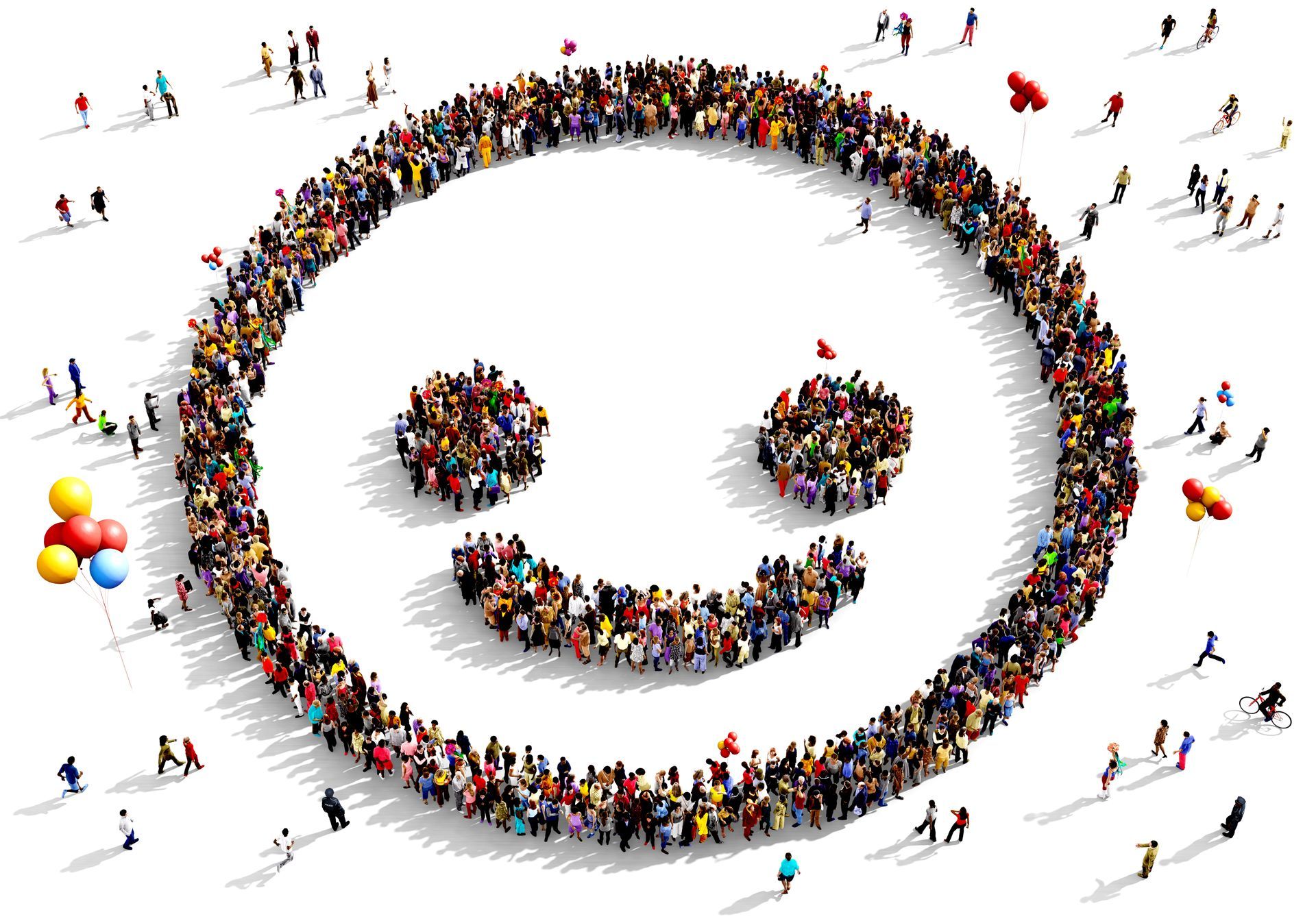 Um grande grupo de pessoas reunidas em forma de um rosto sorridente.