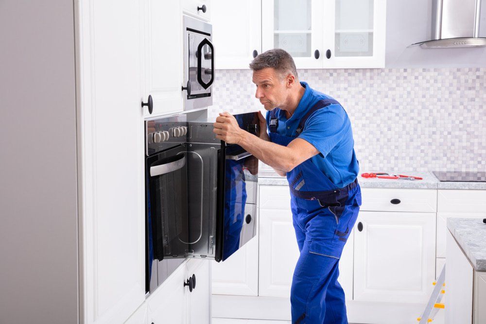 Installing Oven in the Kitchen — Appliance Repairs in Nowra, NSW