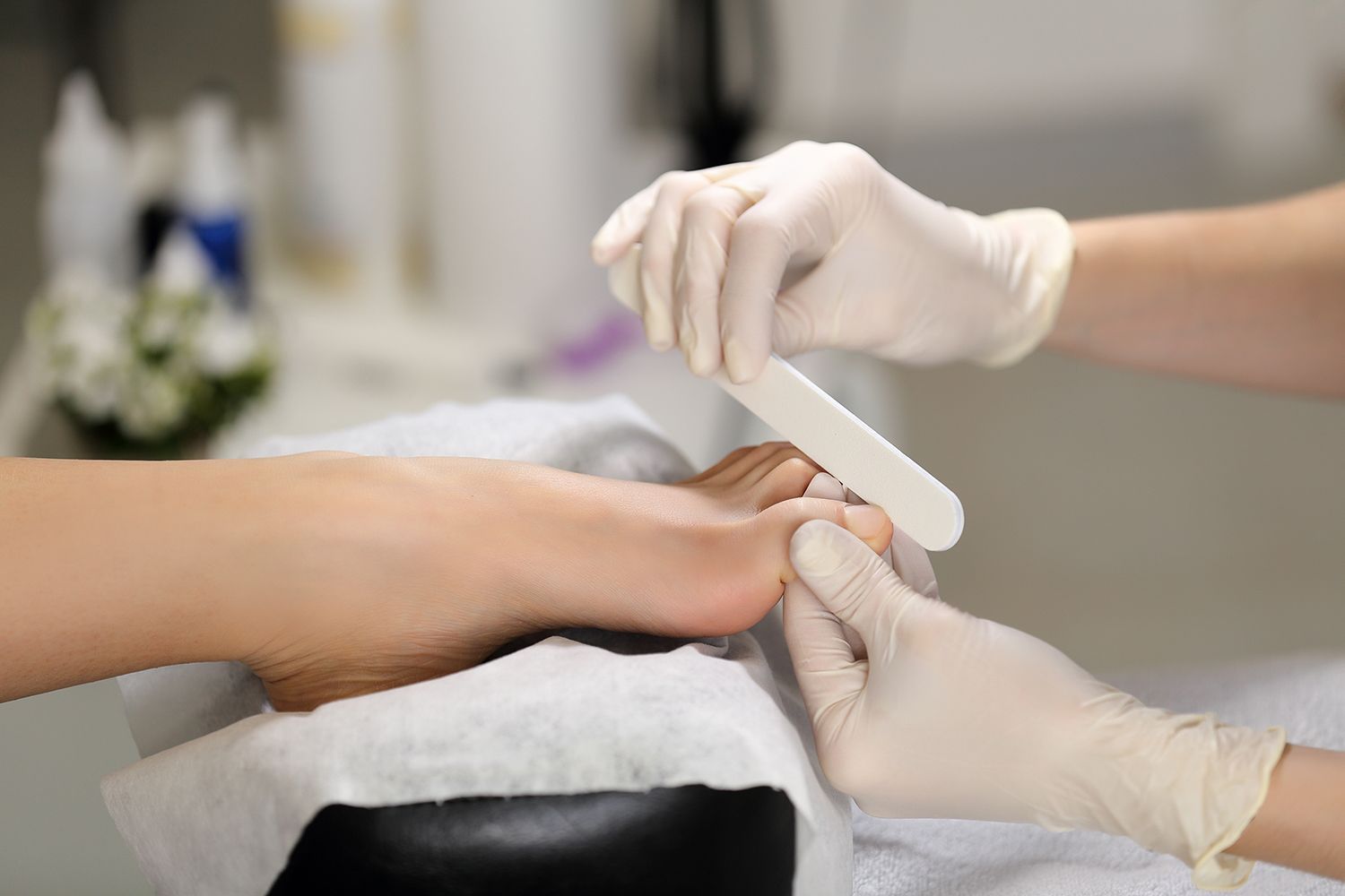 Beautiful salon interior showcasing pedicure services with experts delivering relaxing foot care.