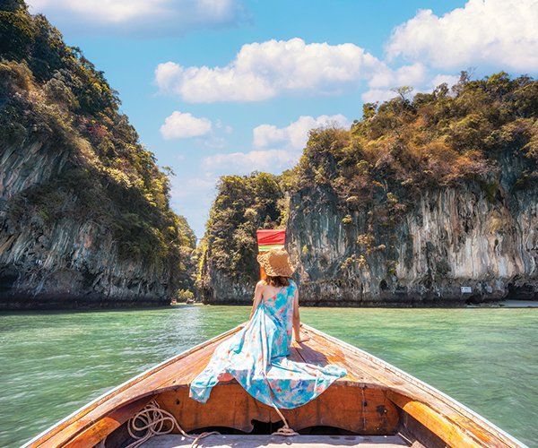 Woman Sitting on a Boat — Clearwater, FL — Island Boat Tours