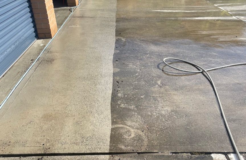 A Before And After Picture Of A Concrete Driveway Being Cleaned With A Pressure Washer — Bulley Roof Restoration, Painting & Pressure Cleaning in Wingham, NSW