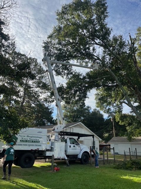 White Truck with a Crane on the Back