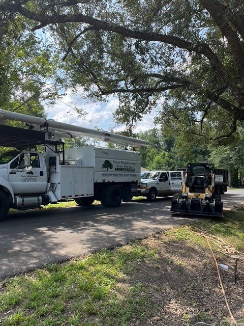 White Trucks and Bulldozer