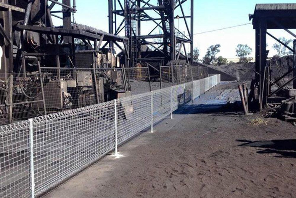 Chain Link Fence Surrounding Mining Site — Dog Gone Fencing in Paget, QLD
