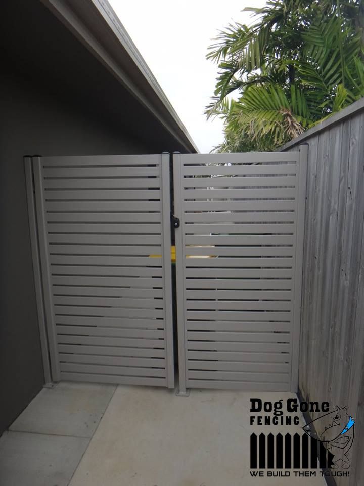 A White Aluminium Slat Gate Fence — Dog Gone Fencing in Paget, QLD