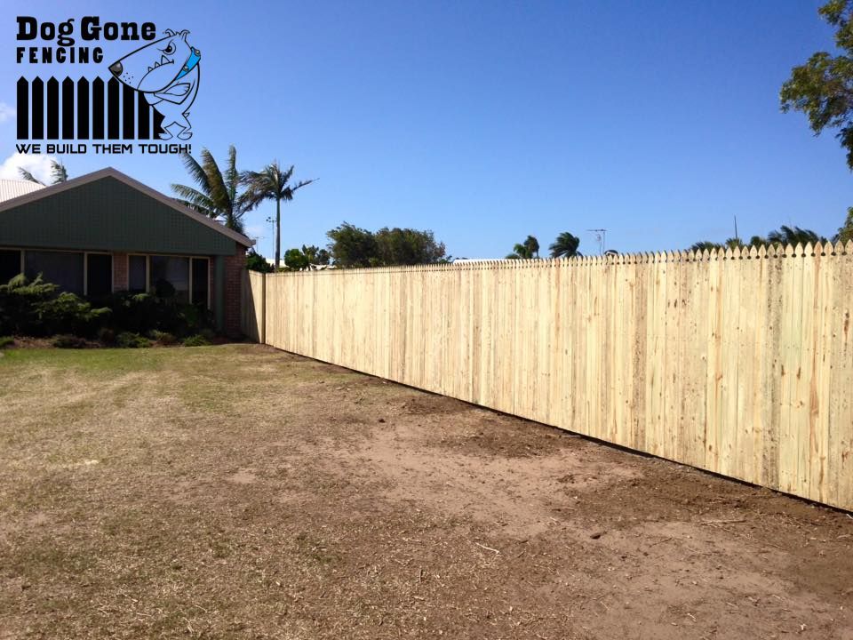 A Wooden Fence Is Being Built By Dog Gone Fencing — Dog Gone Fencing in Paget, QLD