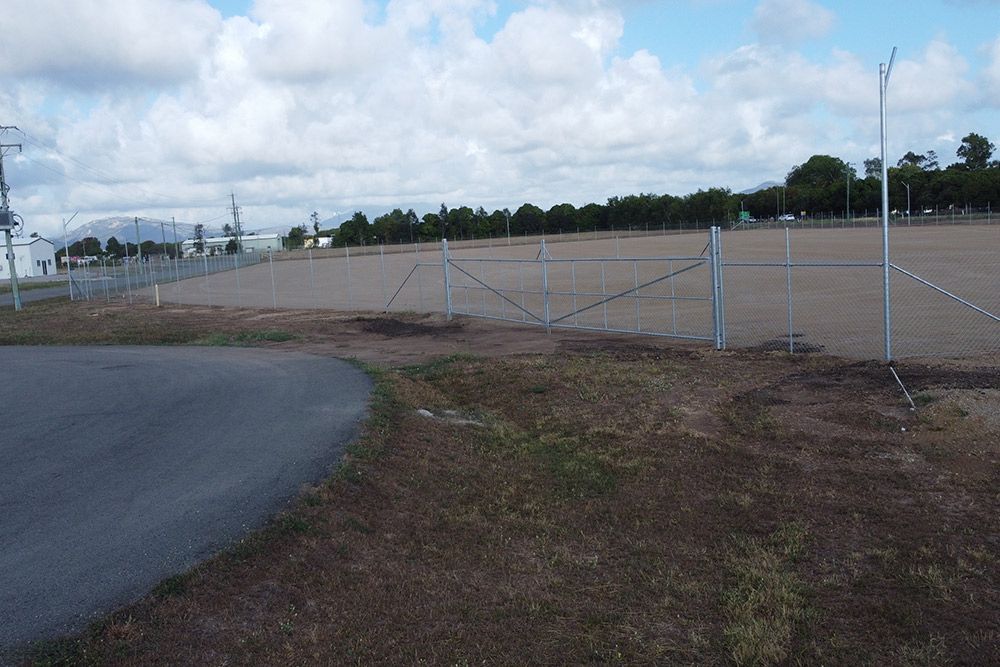 Sturdy Silver Fencing Encloses The Field — Dog Gone Fencing in Paget, QLD