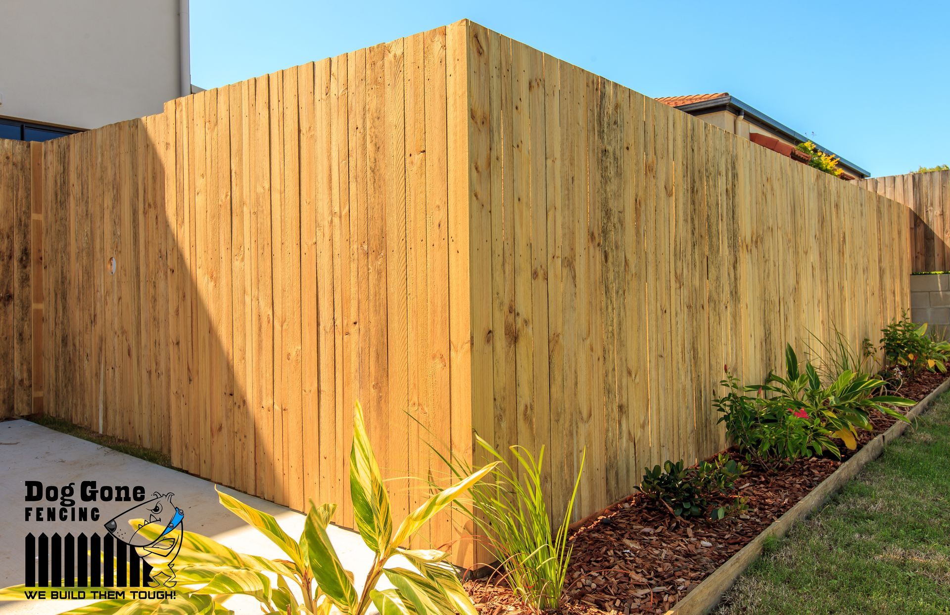 Sturdy Brown Wooden Fence — Dog Gone Fencing in Paget, QLD