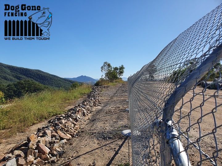 A Chain Link Fence Is Being Built By Dog Gone Fencing  — Dog Gone Fencing in Paget, QLD