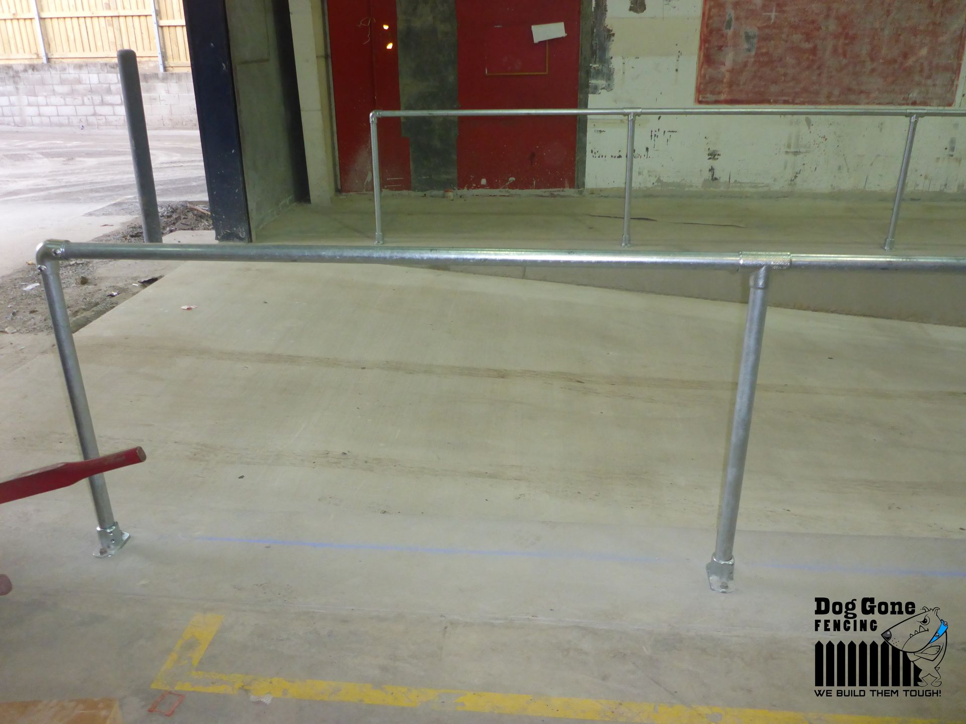 A Picture of a metal railing with a logo that says doe gens Railing - Fencing in Mackay, QLD