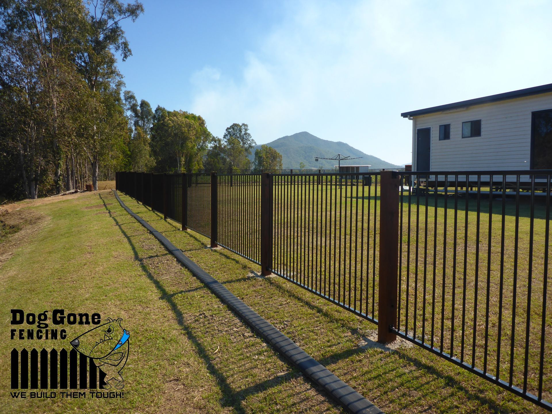 A Fence With A Sign That Says Keep Gone Welding — Dog Gone Fencing in Paget, QLD