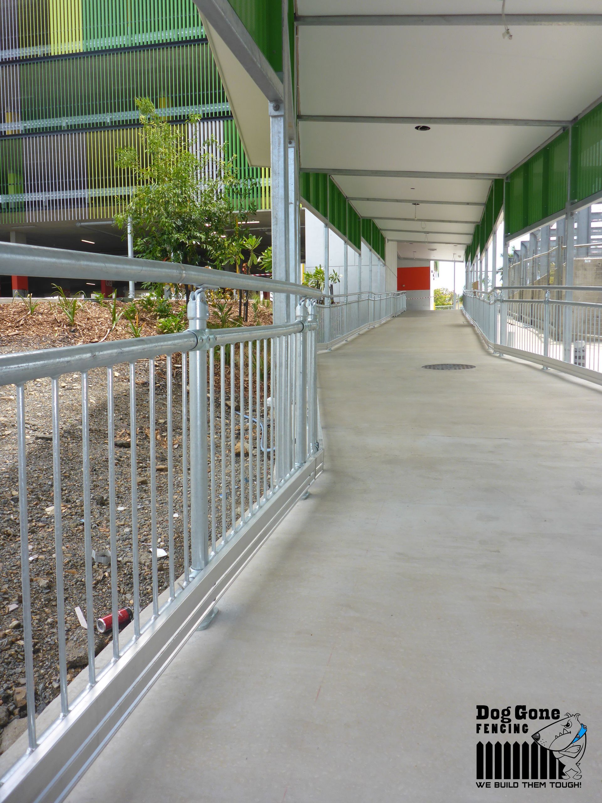 A Walkway With A Railing And A Sign That Says Pig Goose — Dog Gone Fencing in Paget, QLD