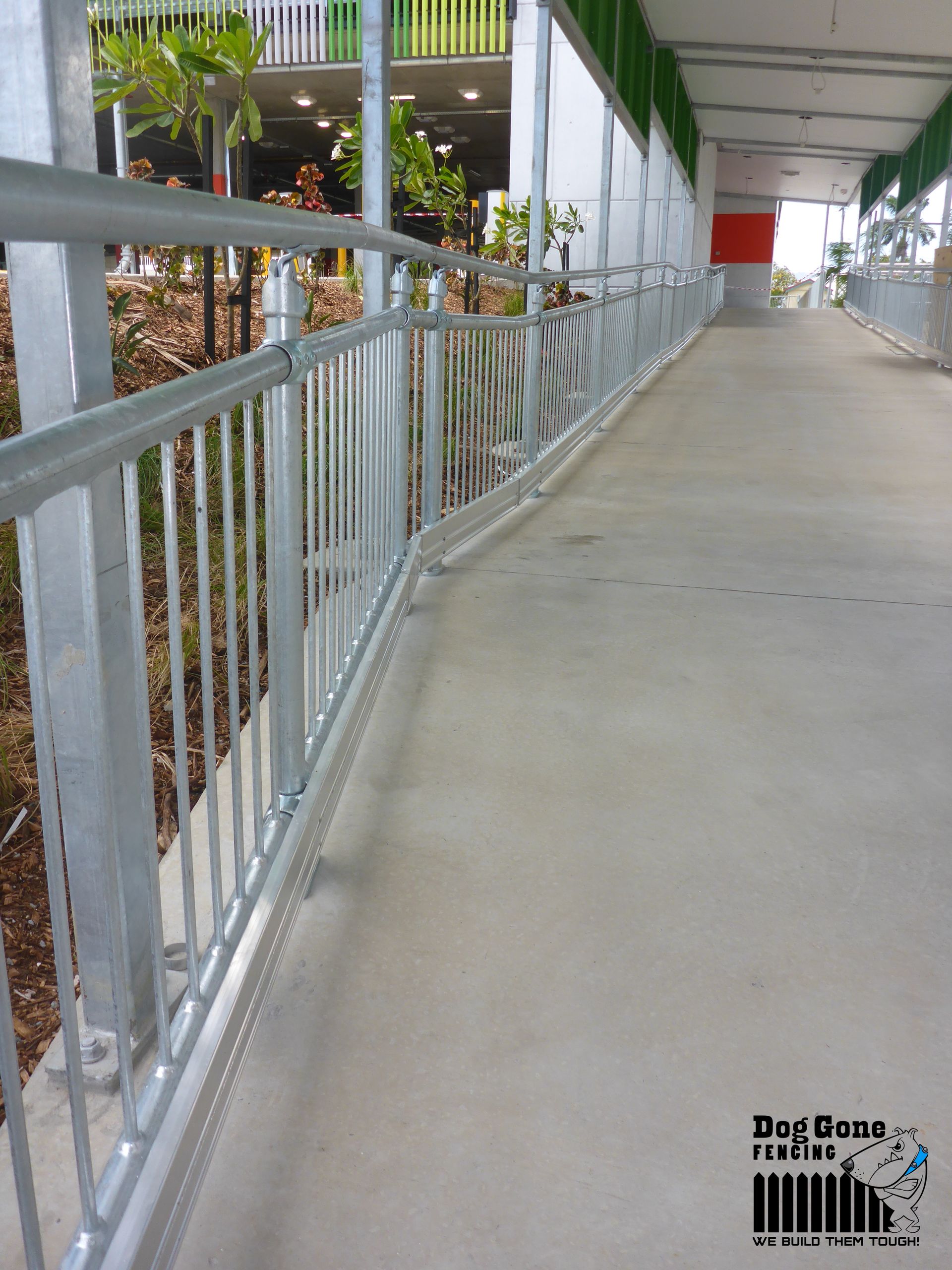 A Picture Of A Walkway With A Railing That Says Piggie Fence — Fencing in Mackay, QLD