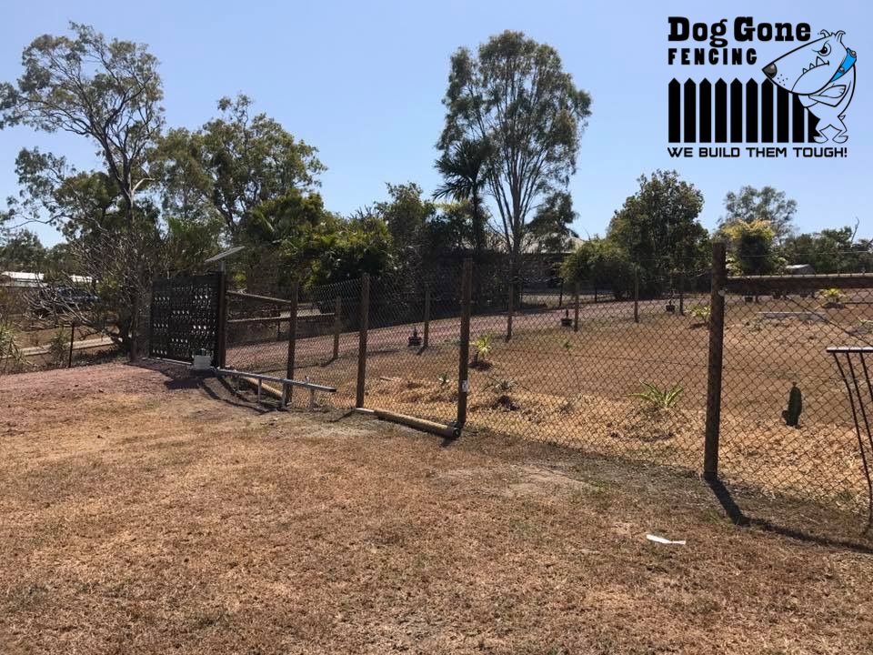 A Dog Gone Fencing Logo Is On A Fence In A Field — Dog Gone Fencing in Paget, QLD