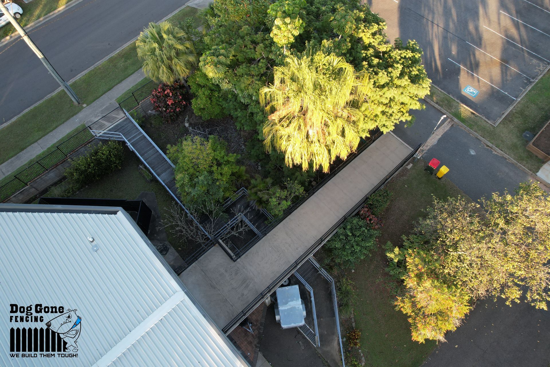 An Aerial View Of A Building With Stairs And Trees — Dog Gone Fencing in Paget, QLD