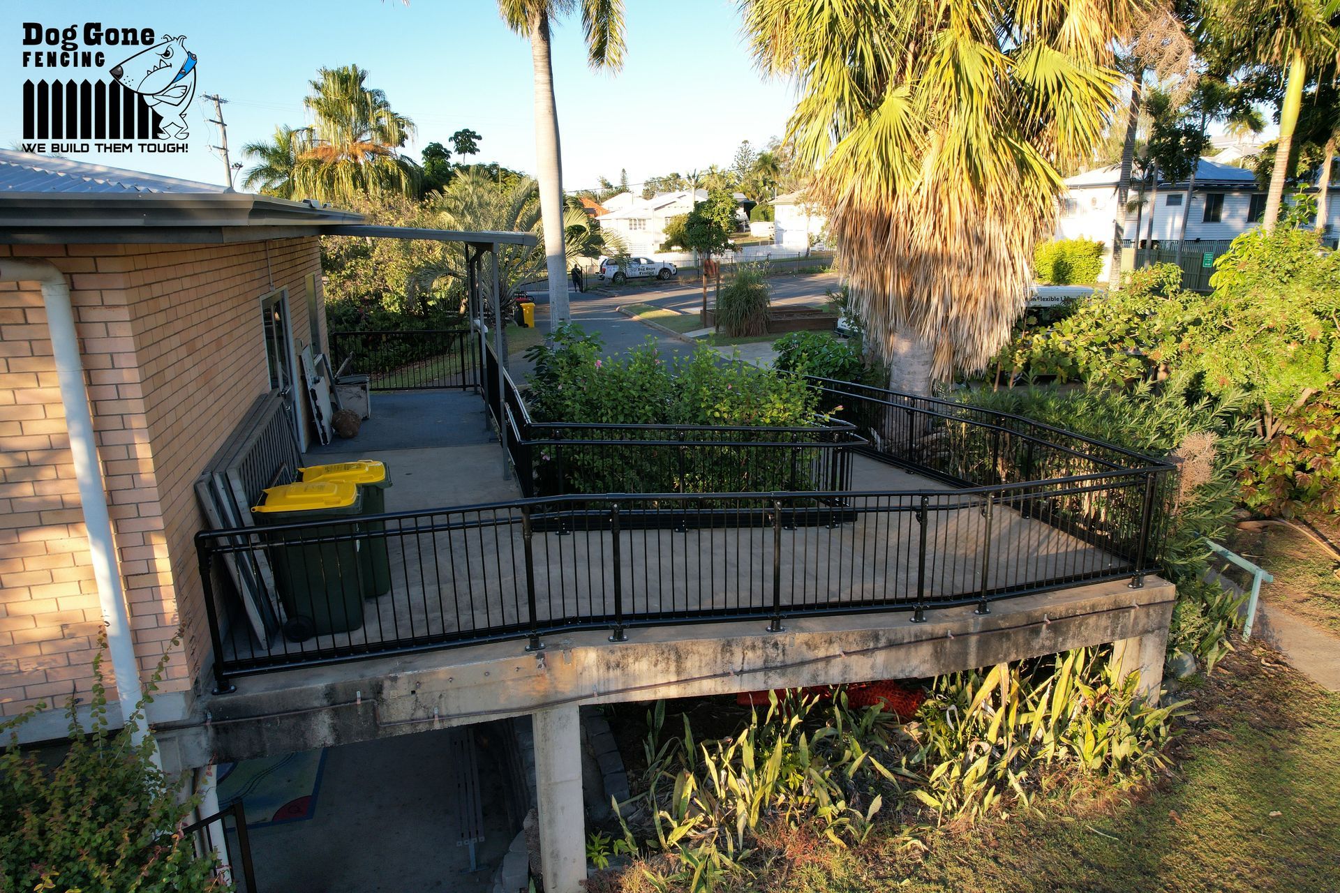 An Aerial View Of A Brick House With A Balcony  — Dog Gone Fencing in Paget, QLD