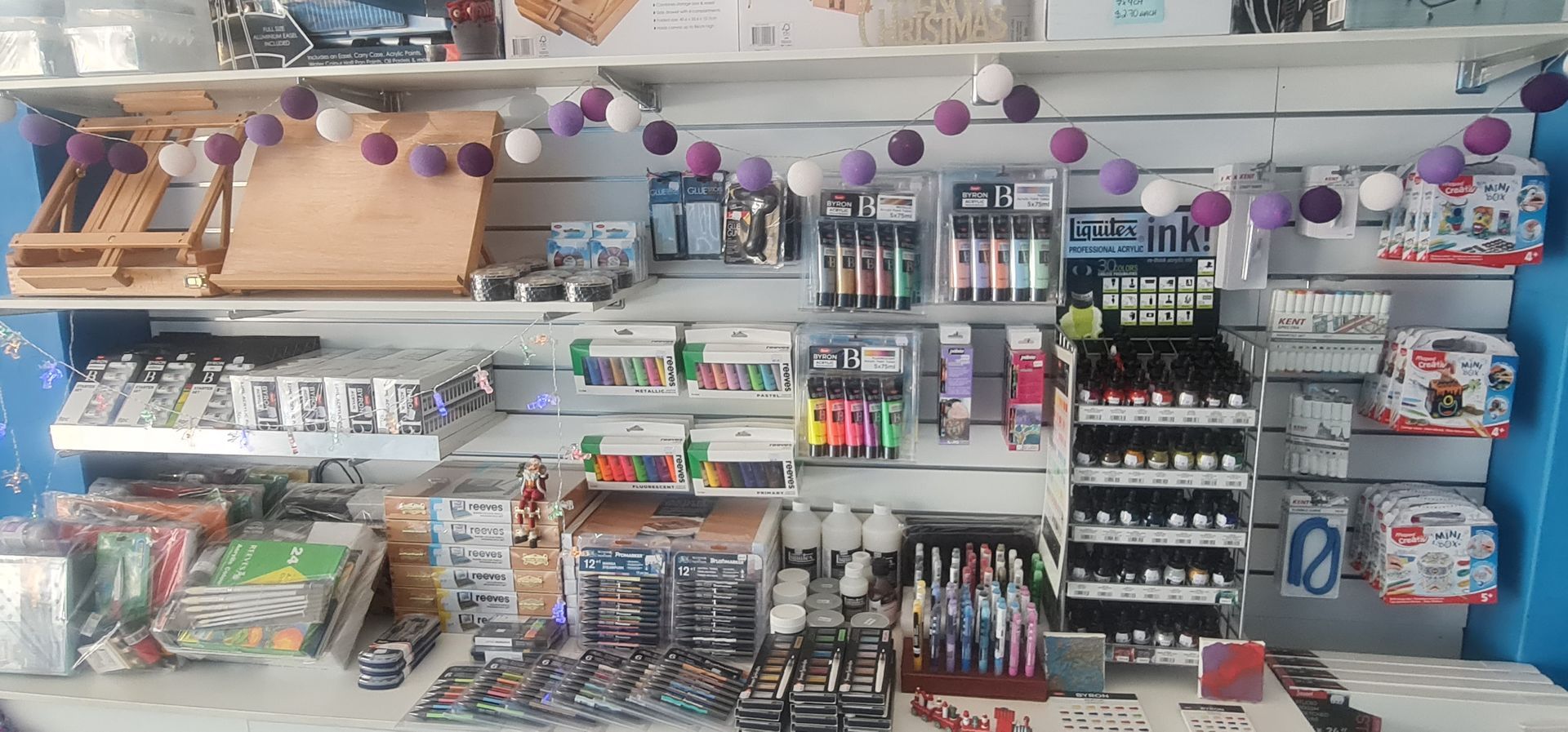 Store Shelf Filled With Pens — Central Western Communications in Emerald, QLD