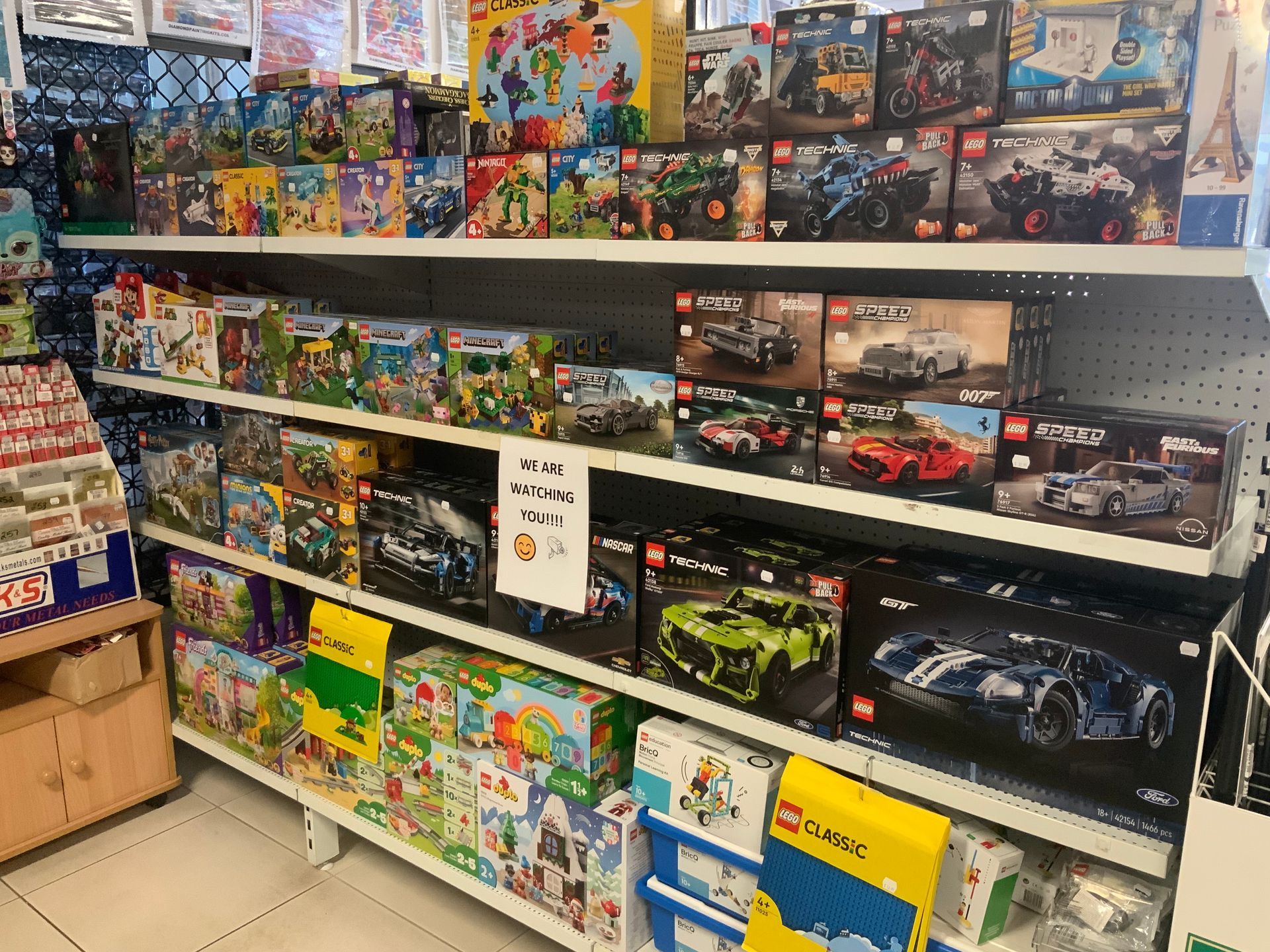 Shelves Stocked With Lego Boxes and Other Toys in a Retail Store — Central Western Communications in Emerald, QLD