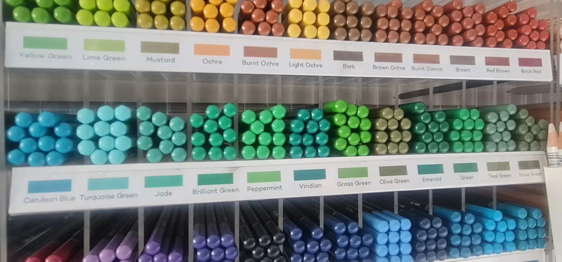 A Display of Colourful Pencils Arranged by Colour in a Store — Central Western Communications in Emerald, QLD