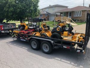 Trailer with Lawn Mower – Hamburg, NY – YAM Landscaping & Lawn Care