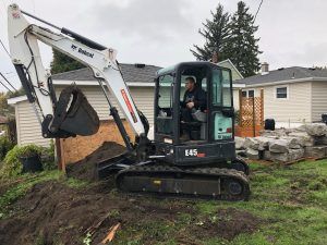 YAM Landscaping & Lawn Care Excavator – Hamburg, NY – YAM Landscaping & Lawn Care