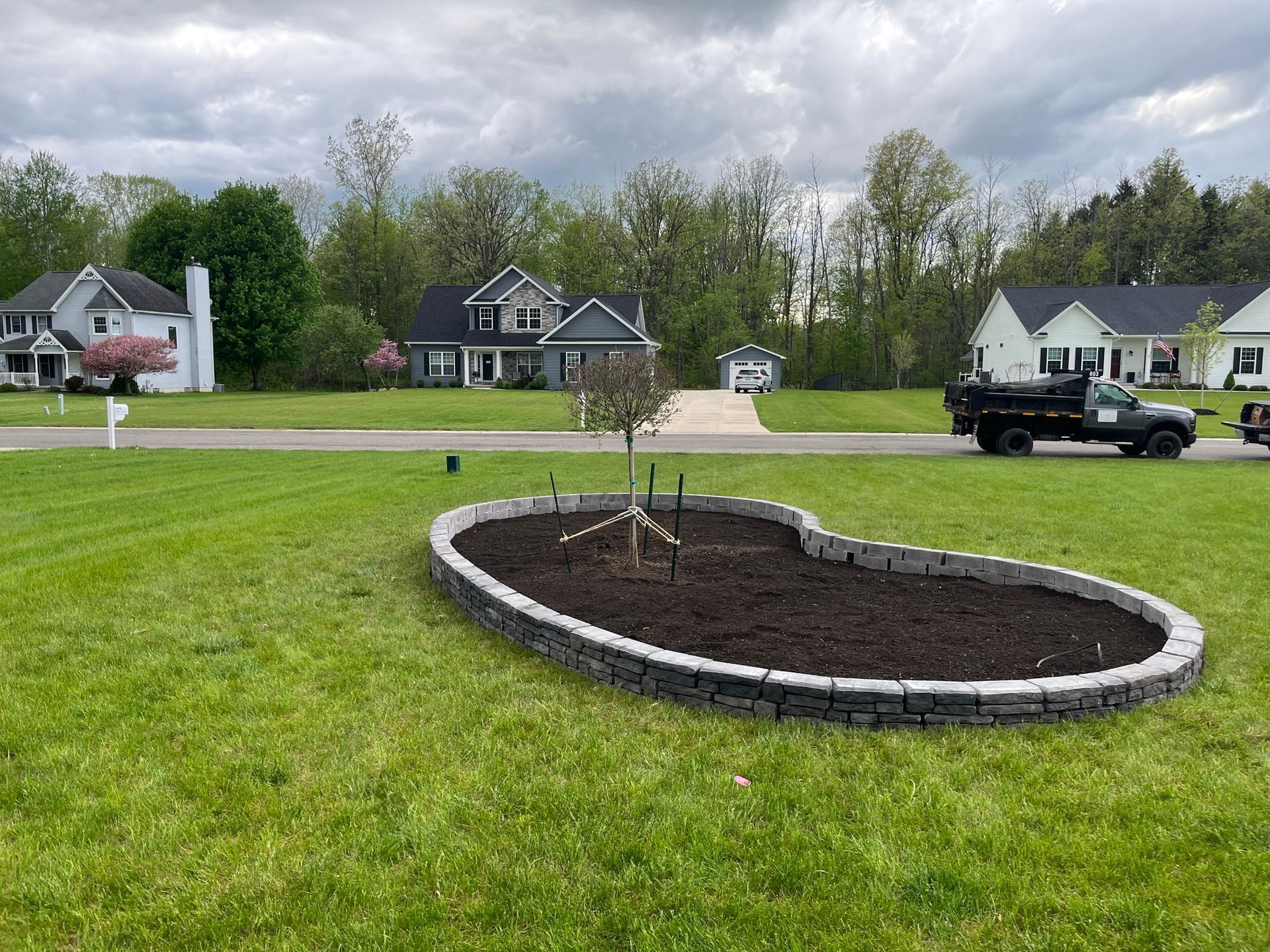 House with Outdoor Landscaping – Hamburg, NY – YAM Landscaping & Lawn Care