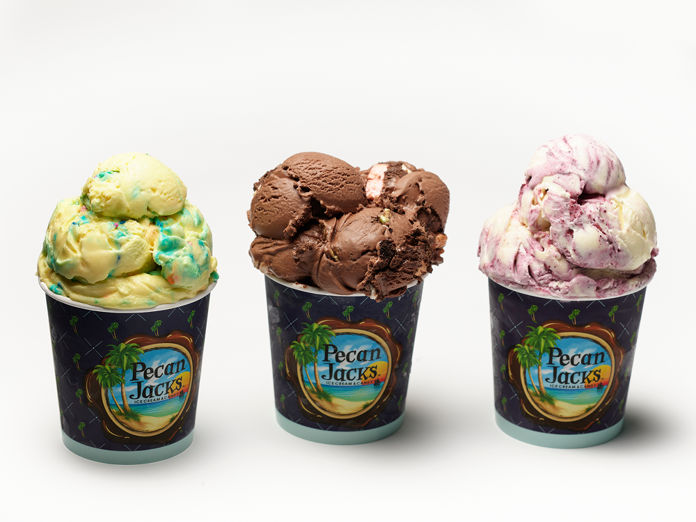 Three cups of pecan jacks ice cream with different flavors