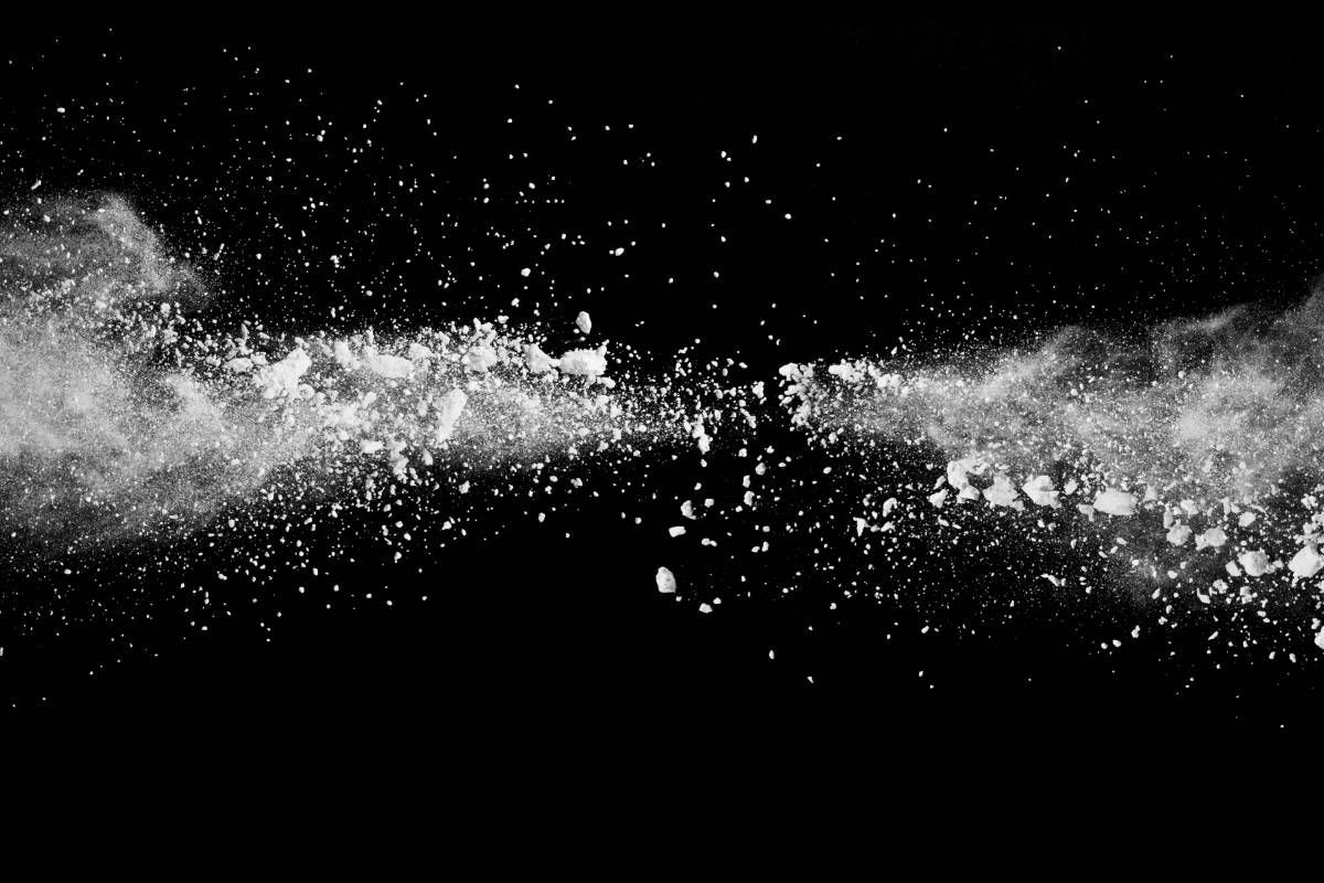 An image of powder flying against a black background near Tollesboro, Kentucky (KY)