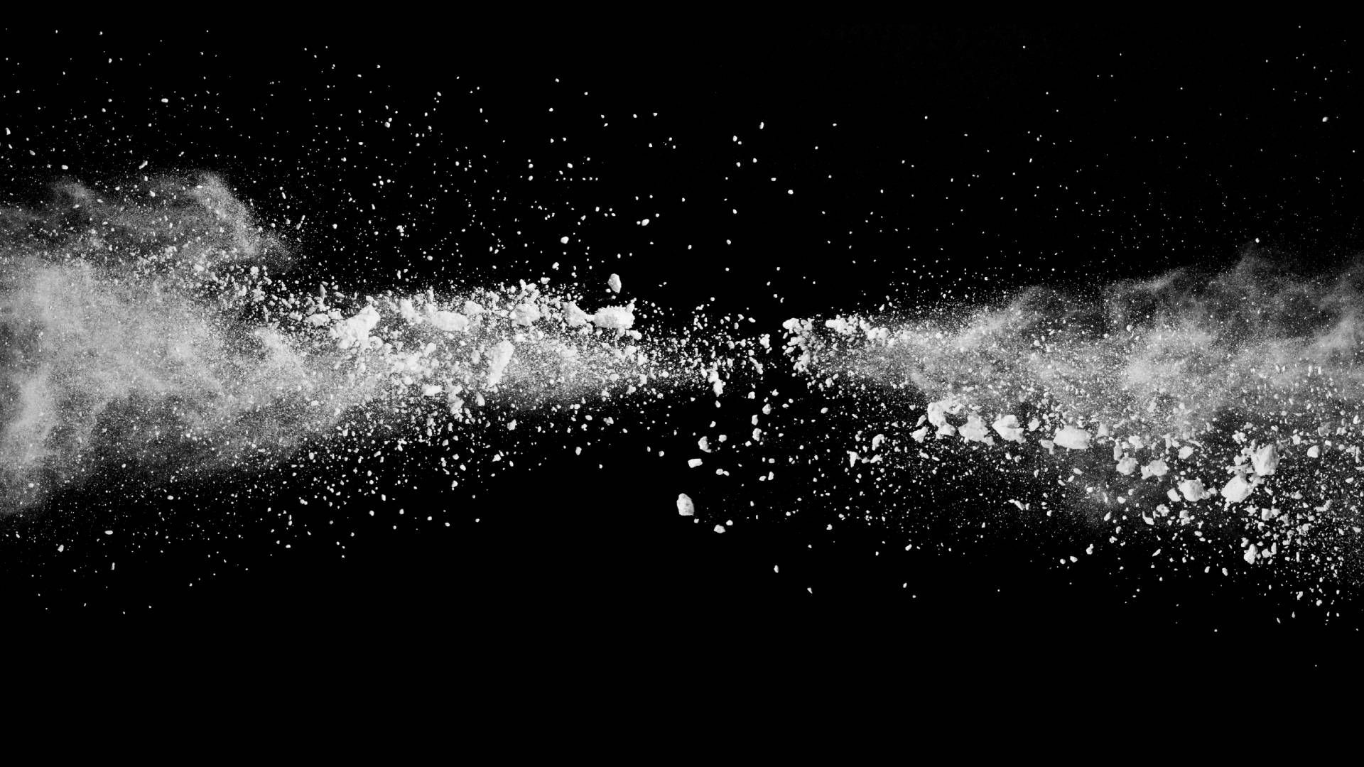 An image of powder flying against a black background near Tollesboro, Kentucky (KY)