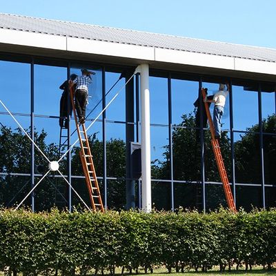 Window Cleaning Service — 2 Men Cleaning the Window Glass in West Warwick, RI