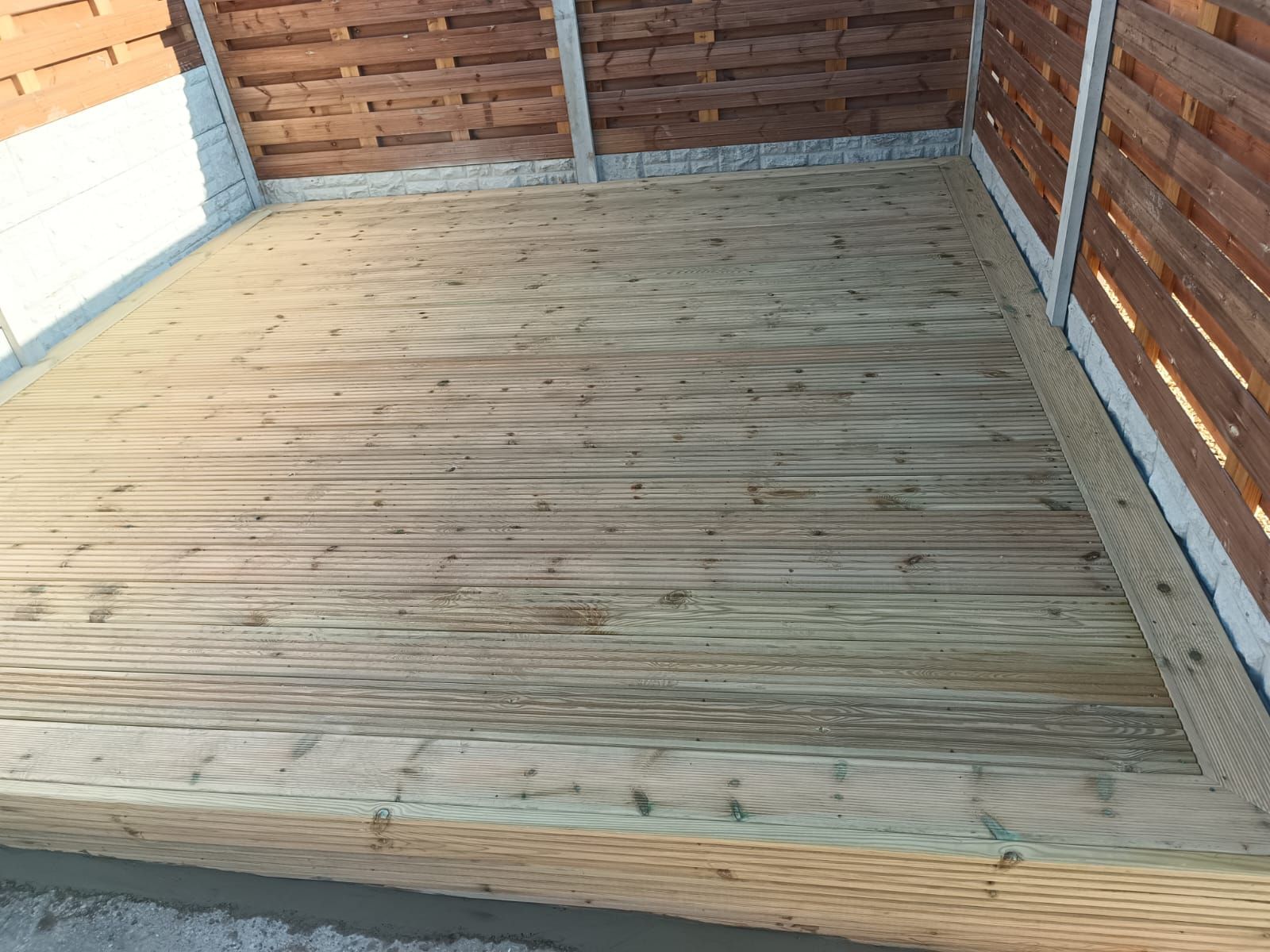 Enclosed treated timber decking