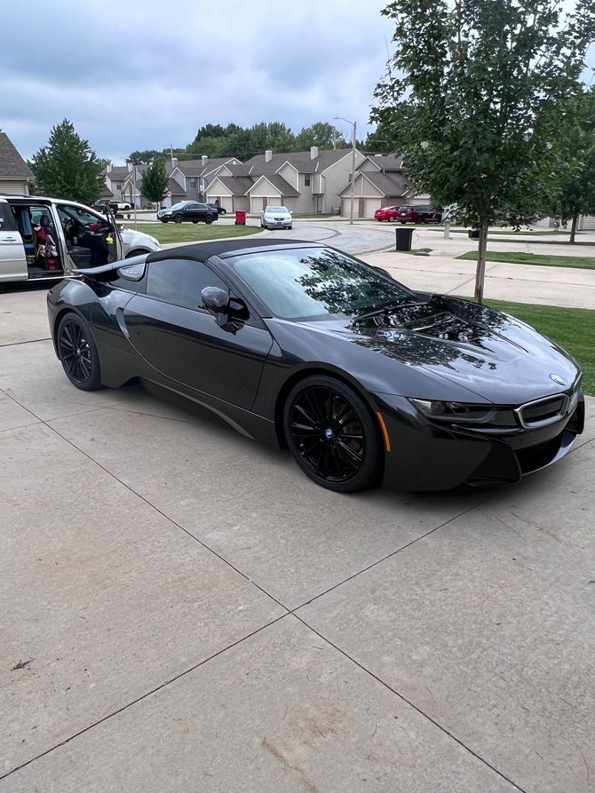 A black sports after car detailing service