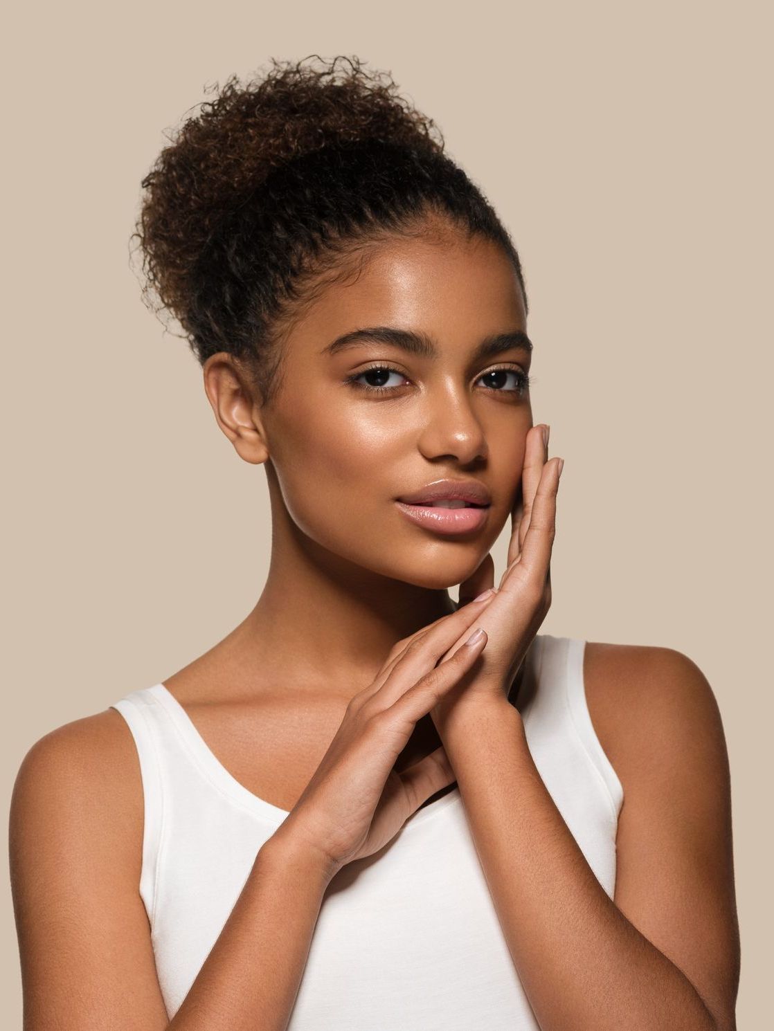 a woman after applying AlumierMD