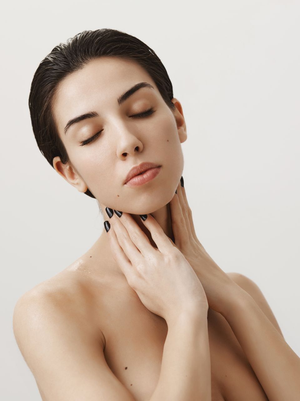 a woman after applying hale derma spray