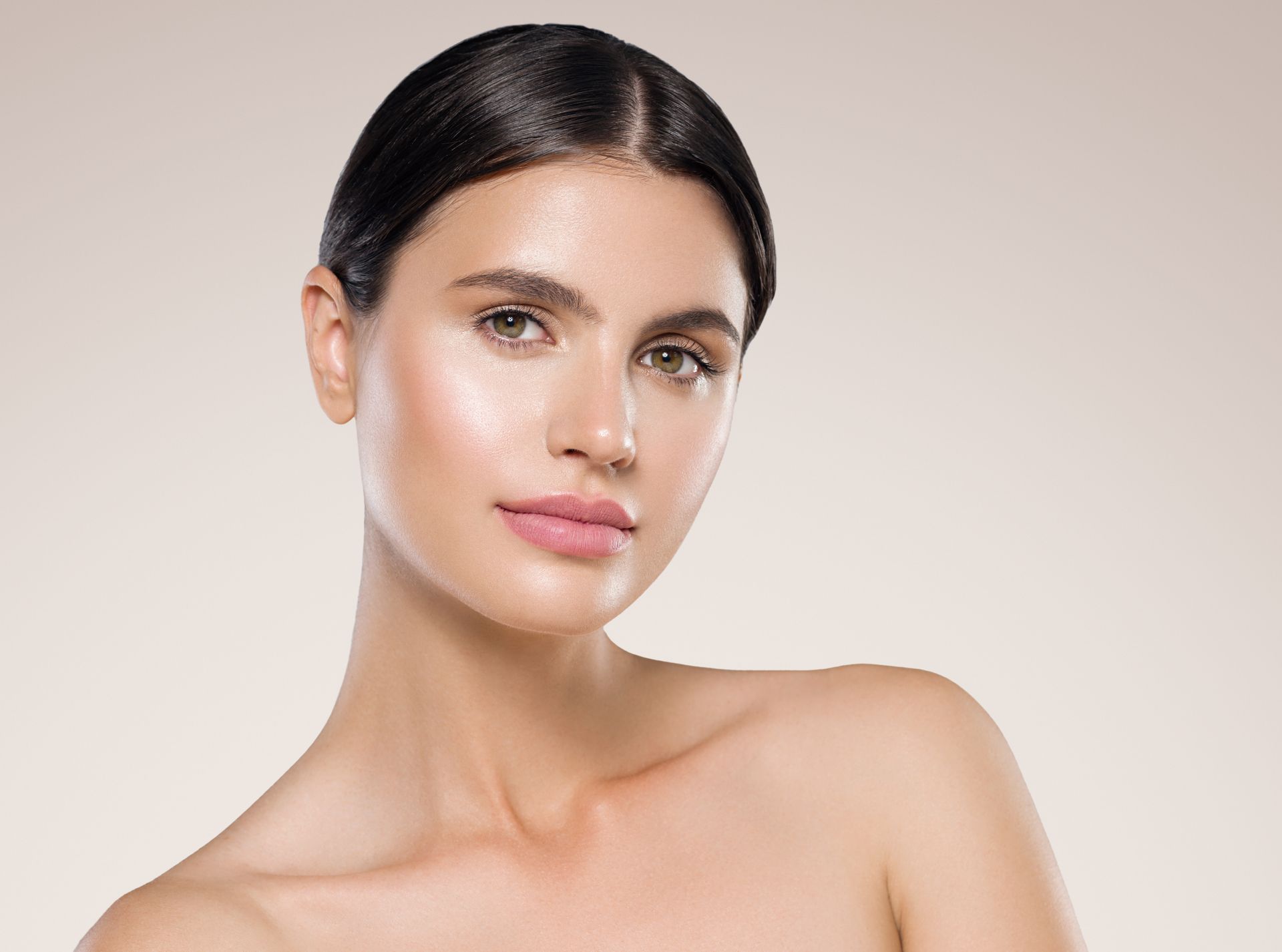 A close up of a woman 's face with a healthy skin.