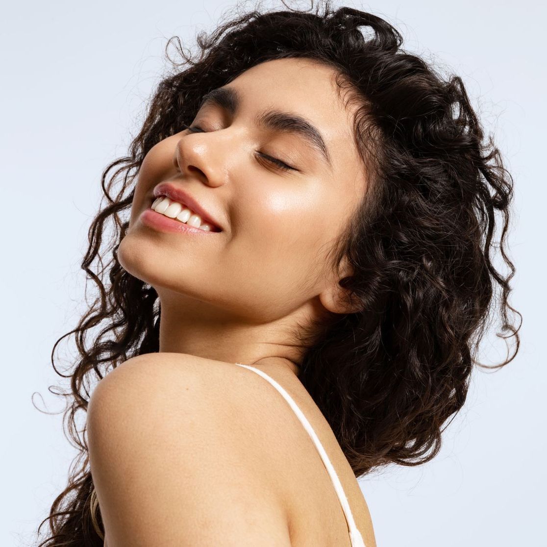 a woman after applying hale derma spray