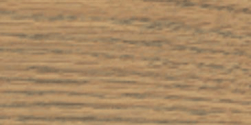 A close up of a piece of wood with a grainy texture.