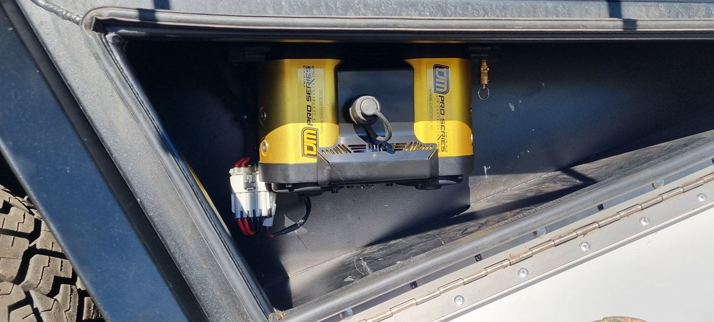 Yellow and Black Surveying Equipment Mounted Inside a Vehicle Storage — Sparky's 4x4 Auto Electrical In Armidale, NSW