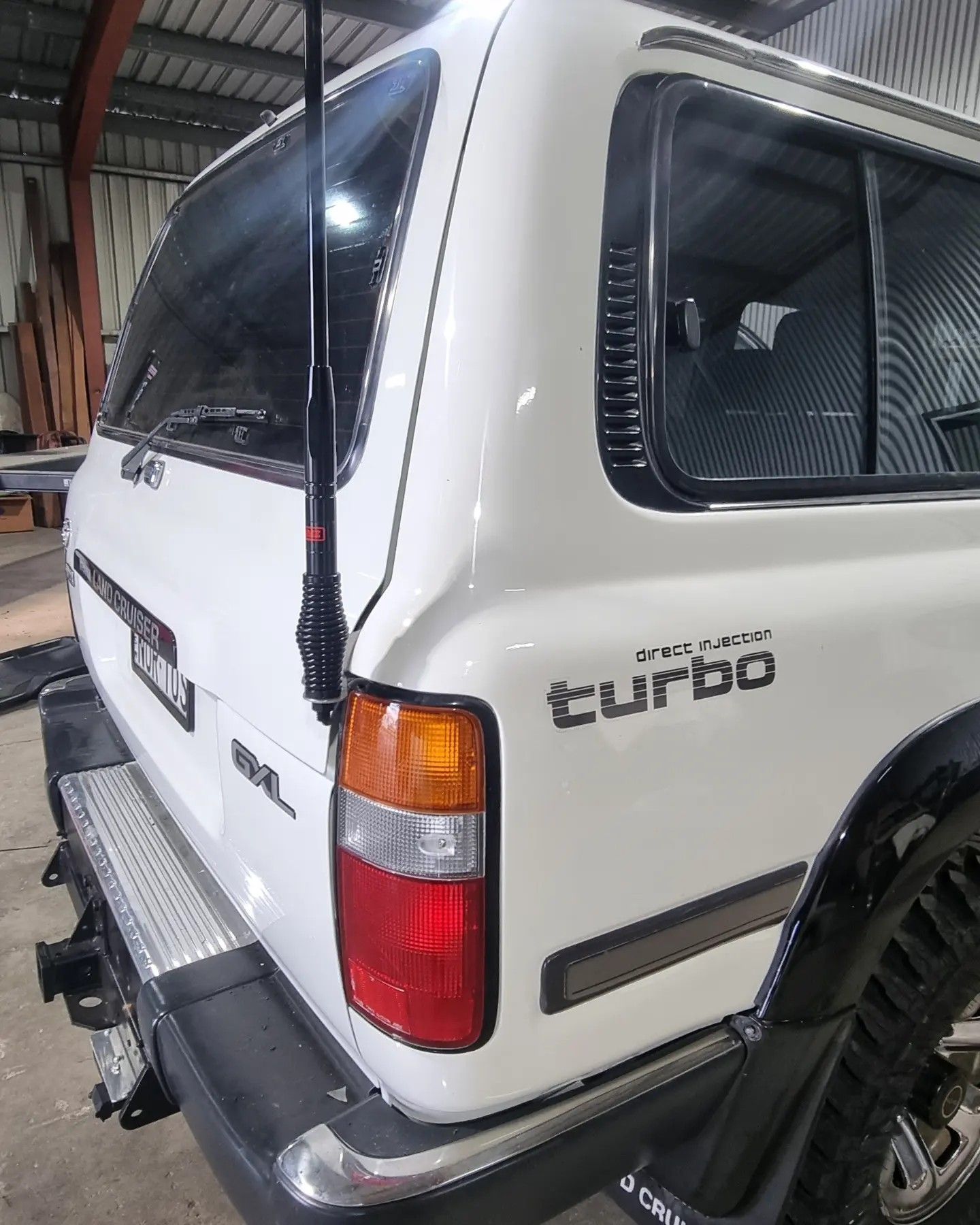 White Suv Rear with Black Antenna — Sparky's 4x4 Auto Electrical In Taminda, NSW