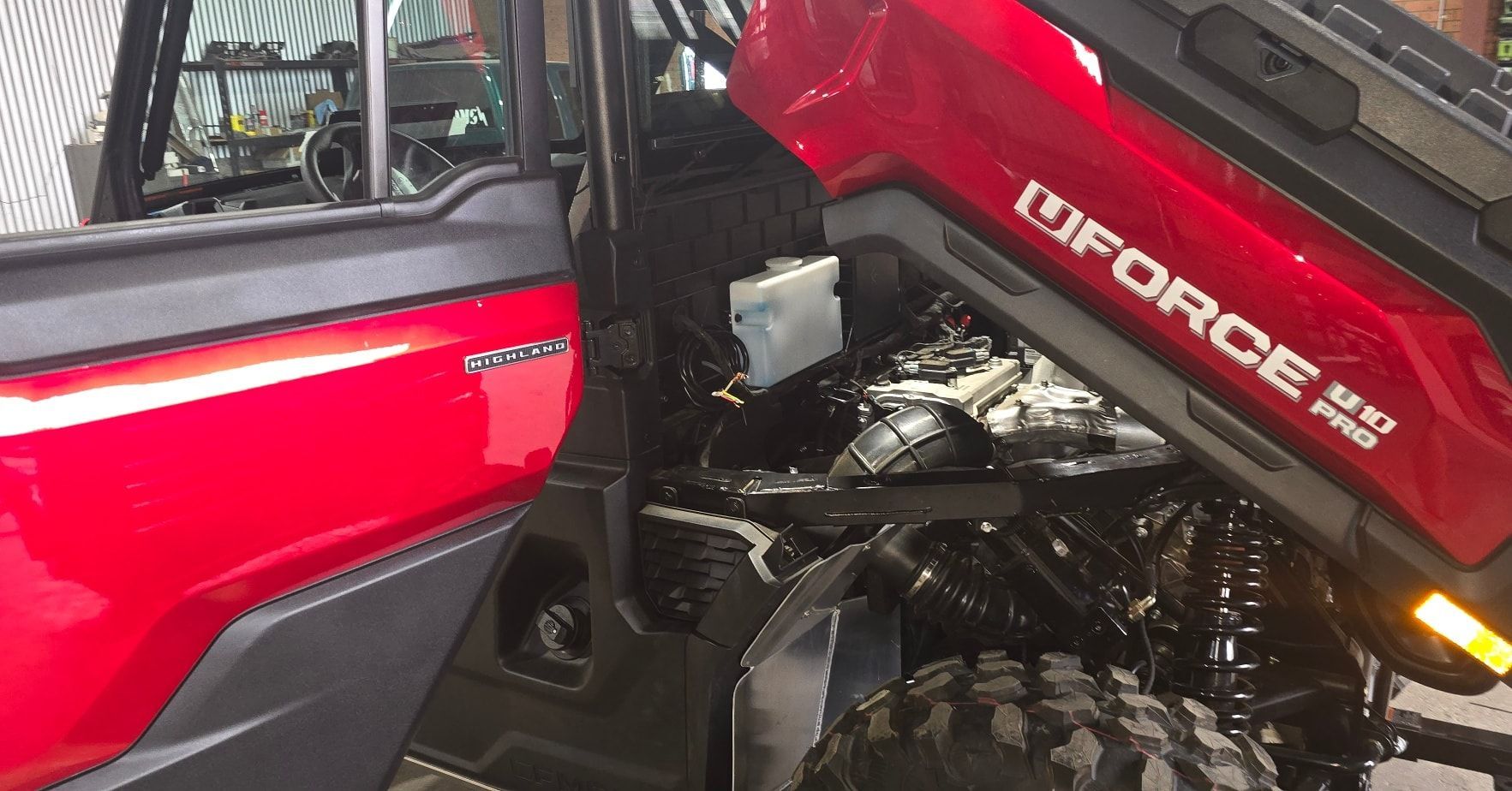 Red CFMOTO UFORCE 500 Pro with A Raised Bed and Open Door — Sparky's 4x4 Auto Electrical In Taminda, NSW