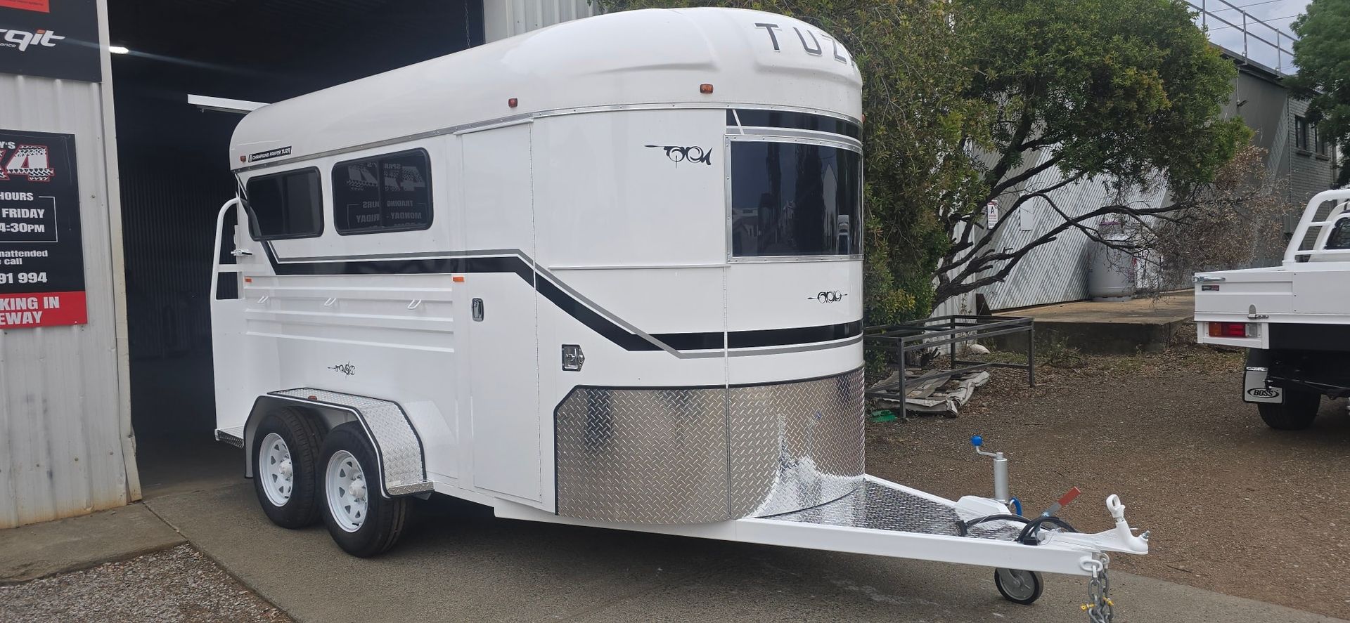 White Horse Trailer with A Silver Front, Parked Outside — Sparky's 4x4 Auto Electrical In Taminda, NSW